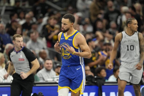San Antonio, Texas, USA; Golden State Warriors guard Stephen Curry (30) reacts after scoring a three-point basket during the second half against the San Antonio Spurs at Frost Bank Center. Mandatory Credit: Scott Wachter-Imagn