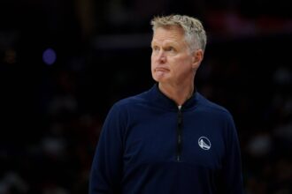 New Orleans, Louisiana, USA; Golden State Warriors head coach Steve Kerr reacts during the first half against the New Orleans Pelicans at Smoothie King Center. Mandatory Credit: Matthew Hinton-Imagn Images