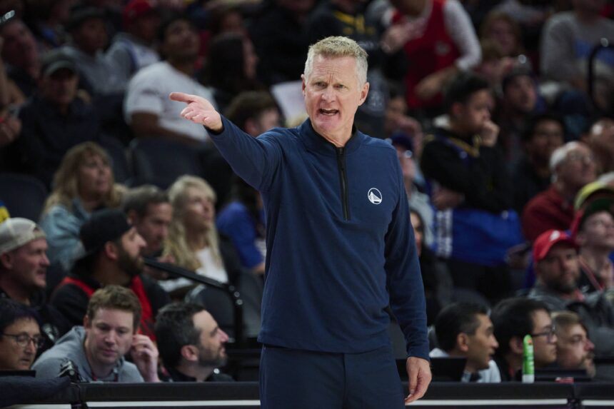 Portland, Oregon, USA; Golden State Warriors Head Coach Steve Kerr questions a referee during the first half against the Portland Trail Blazers at Moda Center. Mandatory Credit: Troy Wayrynen-Imagn Images