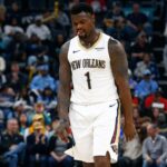 Memphis, Tennessee, USA; New Orleans Pelicans forward Zion Williamson (1) reacts during the first quarter against the Memphis Grizzlies at FedExForum. Mandatory Credit: Petre Thomas-Imagn Images