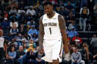 Memphis, Tennessee, USA; New Orleans Pelicans forward Zion Williamson (1) reacts during the first quarter against the Memphis Grizzlies at FedExForum. Mandatory Credit: Petre Thomas-Imagn Images