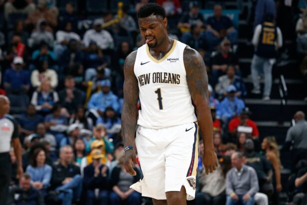 Memphis, Tennessee, USA; New Orleans Pelicans forward Zion Williamson (1) reacts during the first quarter against the Memphis Grizzlies at FedExForum. Mandatory Credit: Petre Thomas-Imagn Images