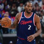Apr 24, 2025; Inglewood, California, USA; Los Angeles Clippers forward Kawhi Leonard (2) moves the ball up court against the Denver Nuggets during the second half of game three in the first round for the 2024 NBA Playoffs at Intuit Dome. Mandatory Credit: Gary A. Vasquez-Imagn Images
