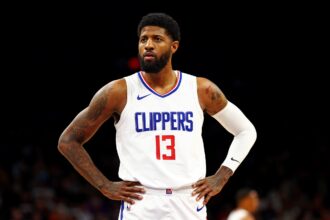 Apr 9, 2024; Phoenix, Arizona, USA; LA Clippers forward Paul George (13) looks on during the first quarter of the game against the Phoenix Suns at Footprint Center. Mandatory Credit: Mark J. Rebilas-Imagn Images