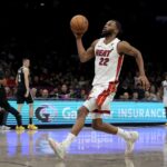 Dec 18, 2025; Brooklyn, New York, USA; Miami Heat forward Andrew Wiggins (22) drives uncontested to the basket against the Brooklyn Nets during the fourth quarter at Barclays Center. Mandatory Credit: Brad Penner-Imagn Images