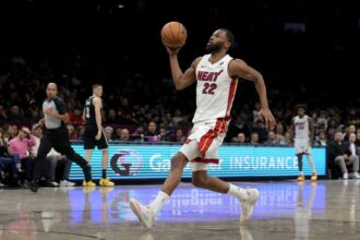 Dec 18, 2025; Brooklyn, New York, USA; Miami Heat forward Andrew Wiggins (22) drives uncontested to the basket against the Brooklyn Nets during the fourth quarter at Barclays Center. Mandatory Credit: Brad Penner-Imagn Images