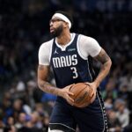 Dec 12, 2025; Dallas, Texas, USA; Dallas Mavericks forward Anthony Davis (3) looks to pass the ball during the game between the Mavericks and the Nets at the American Airlines Center. Mandatory Credit: Jerome Miron-Imagn Images