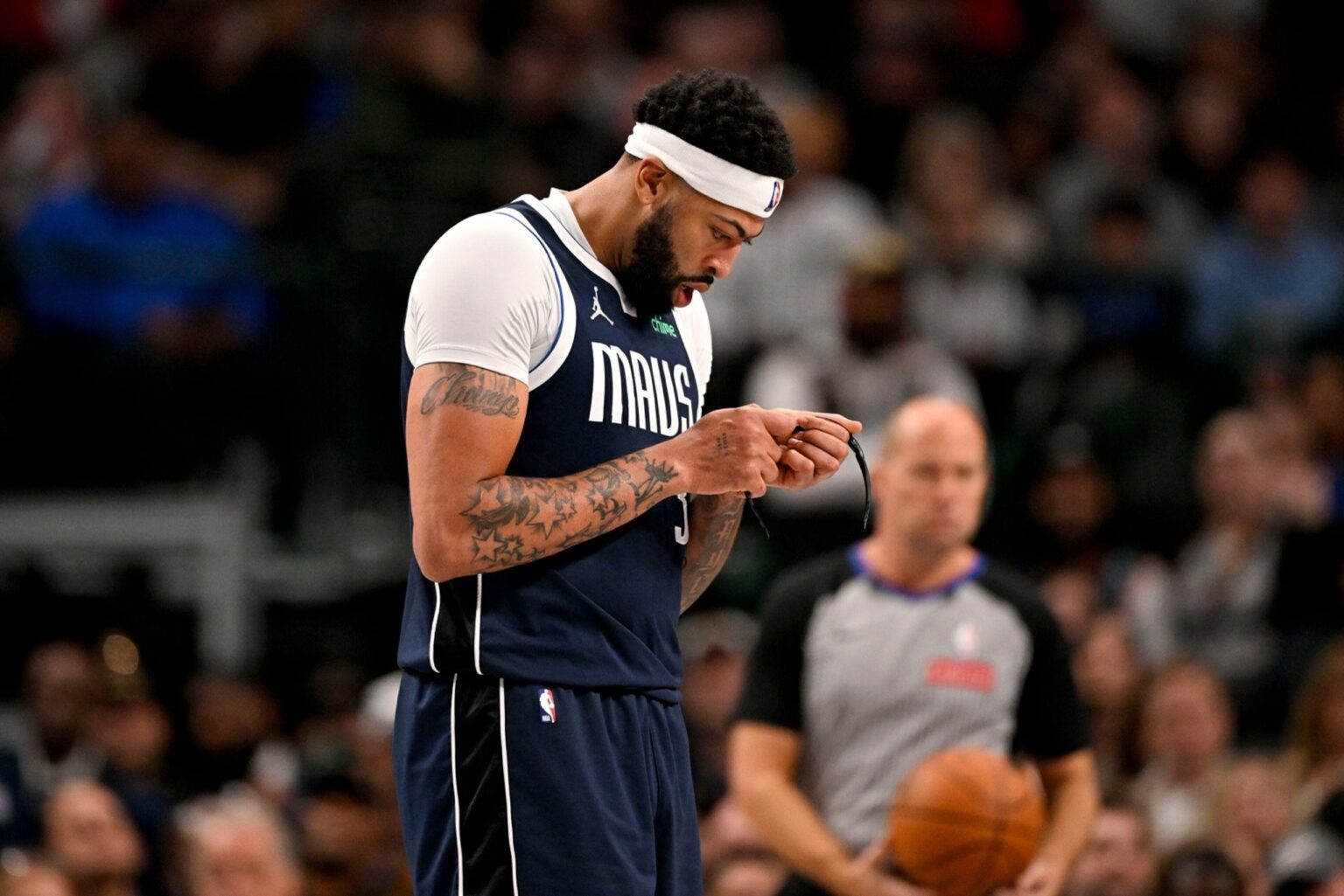 Dec 18, 2025; Dallas, Texas, USA; Dallas Mavericks forward Anthony Davis (3) adjusts his glasses during the second half against the Detroit Pistons at the American Airlines Center. Mandatory Credit: Jerome Miron-Imagn Images