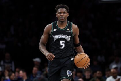 Nov 30, 2025; Minneapolis, Minnesota, USA; Minnesota Timberwolves guard Anthony Edwards (5) dribbles the ball against the San Antonio Spurs during the second half at Target Center. Mandatory Credit: Matt Krohn-Imagn Images