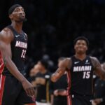 Miami Heat center Bam Adebayo (13) walks to the sideline during a break against the Boston Celtics in the second half at TD Garden.