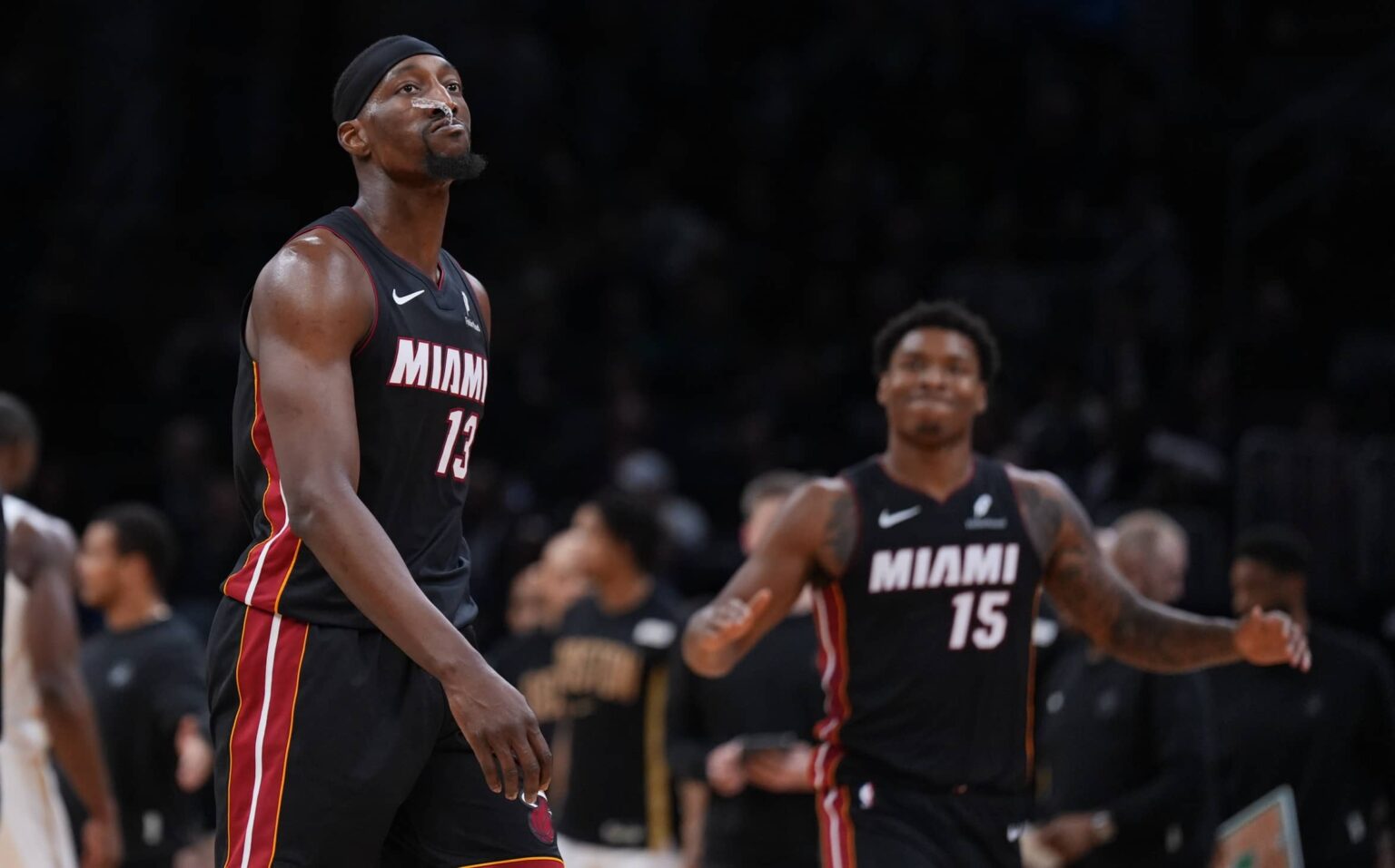Miami Heat center Bam Adebayo (13) walks to the sideline during a break against the Boston Celtics in the second half at TD Garden.