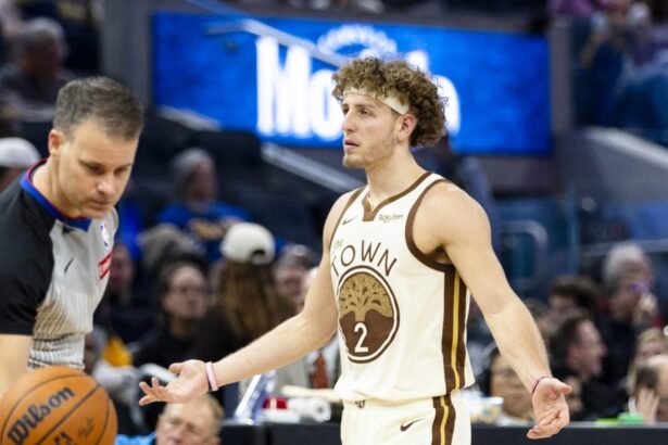 Nov 29, 2025; San Francisco, California, USA; Golden State Warriors guard Brandin Podziemski (2) reacts during the third quarter against the New Orleans Pelicans at Chase Center. Mandatory Credit: John Hefti-Imagn Images