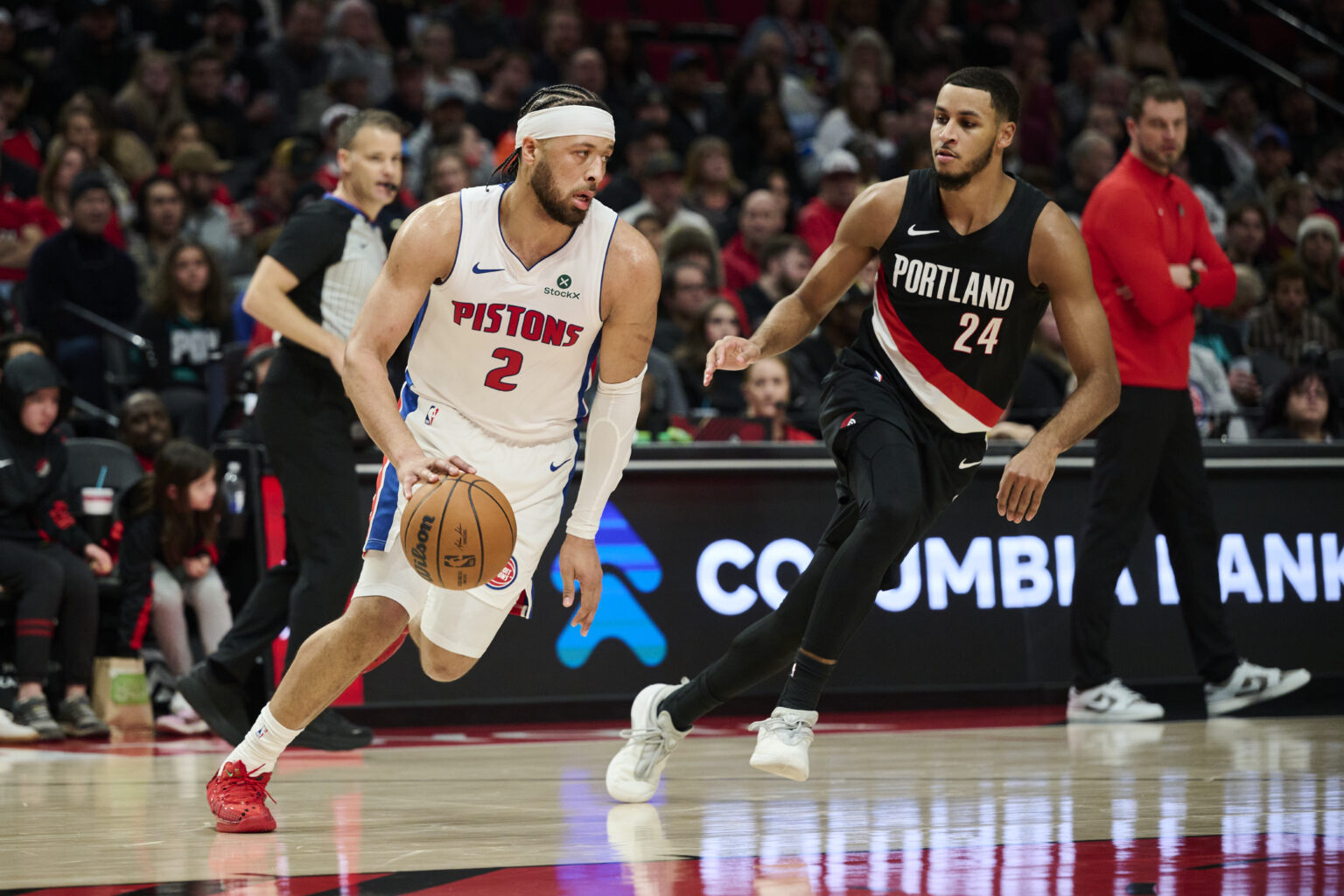 Dec 22, 2025; Portland, Oregon, USA; Detroit Pistons guard Cade Cunningham (2) dribbles the ball during the first half against Portland Trail Blazers forward Kris Murray (24) at Moda Center. Mandatory Credit: Troy Wayrynen-Imagn Images