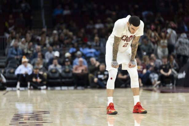 Dec 19, 2025; Cleveland, Ohio, USA; Cleveland Cavaliers guard Lonzo Ball (2) stands back during free throws by the Chicago Bulls during the fourth quarter at Rocket Arena. Mandatory Credit: Scott Galvin-Imagn Images