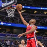 Nov 20, 2025; Orlando, Florida, USA; LA Clippers guard Chris Paul (3) goes to the basket during the second half against the Orlando Magic at Kia Center. Mandatory Credit: Mike Watters-Imagn Images