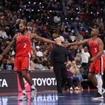 Nov 28, 2025; Inglewood, California, USA; Los Angeles Clippers forward Kawhi Leonard (2) high-fives guard Chris Paul (3) during the second half against the Memphis Grizzlies at Intuit Dome. Mandatory Credit: Kiyoshi Mio-Imagn Images
