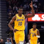 Los Angeles Lakers center Christian Koloko (10) makes a three-point basket against the Golden State Warriors in the fourth quarter at Chase Center.