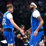 Oct 24, 2025; Dallas, Texas, USA; Dallas Mavericks forward Cooper Flagg (32) celebrates with Dallas Mavericks forward Anthony Davis (3) during the first quarter against the Washington Wizards at American Airlines Center. Mandatory Credit: Kevin Jairaj-Imagn Images