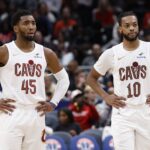 Dec 12, 2025; Washington, District of Columbia, USA; Cleveland Cavaliers guard Donovan Mitchell (45) stands next to Cavaliers guard Darius Garland (10) on court during a stoppage in play against the Washington Wizards in the second half at Capital One Arena. Mandatory Credit: Geoff Burke-Imagn Images