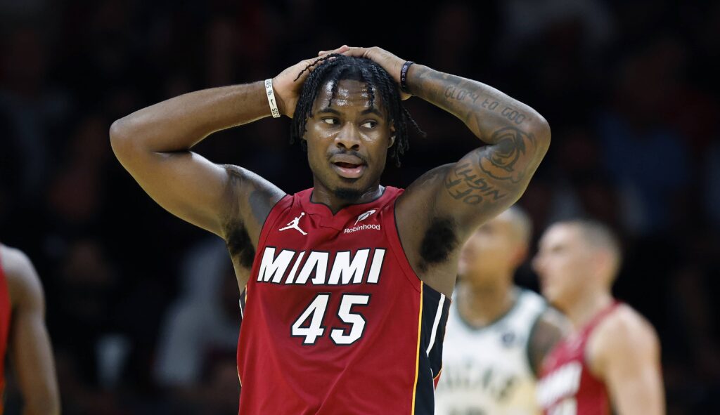 Nov 26, 2025; Miami, Florida, USA; Miami Heat guard Davion Mitchell (45) stands on the court during a time out against the Milwaukee Bucks during the first half of an NBA Cup game at Kaseya Center. Mandatory Credit: Rhona Wise-Imagn Images