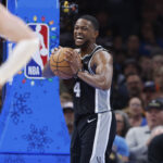 Dec 25, 2025; Oklahoma City, Oklahoma, USA; San Antonio Spurs guard De'Aaron Fox (4) celebrates after a play against the Oklahoma City Thunder during the second half at Paycom Center. Mandatory Credit: Alonzo Adams-Imagn Images