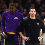Dec 23, 2025; Phoenix, Arizona, USA; Los Angeles Lakers center Deandre Ayton (left) and head coach JJ Redick against the Phoenix Suns at Mortgage Matchup Center. Mandatory Credit: Mark J. Rebilas-Imagn Images