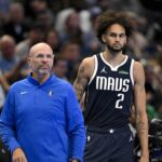 Nov 14, 2025; Dallas, Texas, USA; Dallas Mavericks head coach Jason Kidd and center Dereck Lively II (2) look on during the second half against the LA Clippers in an NBA Cup game at the American Airlines Center. Mandatory Credit: Jerome Miron-Imagn Images