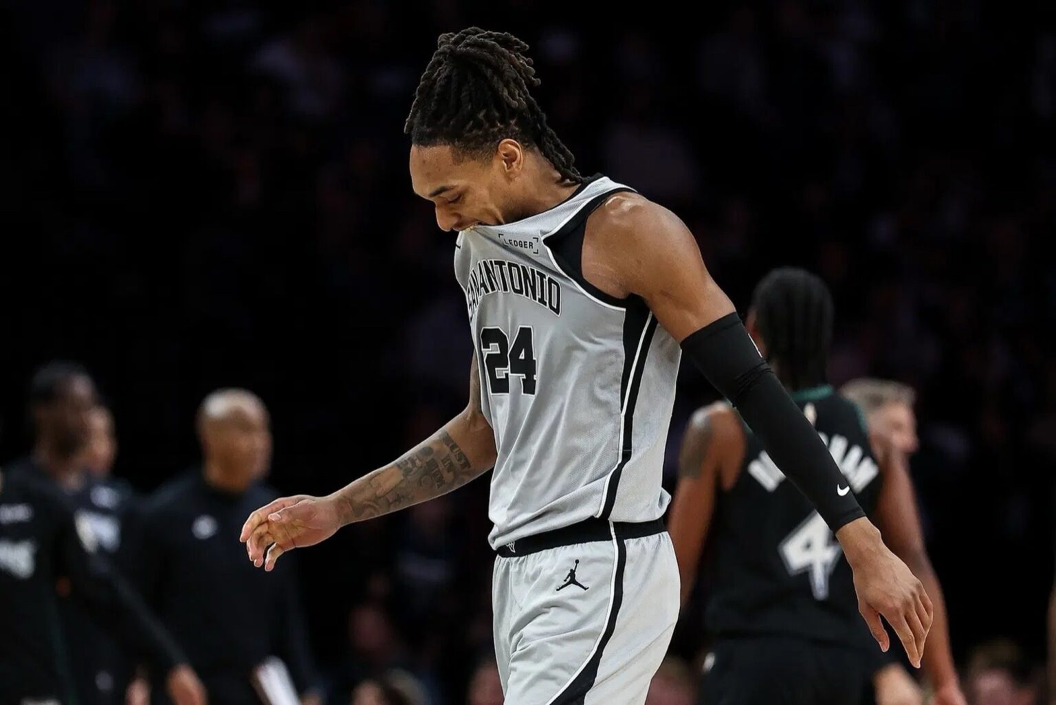 Nov 30, 2025; Minneapolis, Minnesota, USA; San Antonio Spurs guard Devin Vassell (24) reacts during the first half against the Minnesota Timberwolves at Target Center. Mandatory Credit: Matt Krohn-Imagn Images