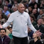 Nov 14, 2025; Milwaukee, Wisconsin, USA; Milwaukee Bucks head coach Doc Rivers reacts to a call during the second quarter against the Charlotte Hornets at Fiserv Forum. Mandatory Credit: Jeff Hanisch-Imagn Images