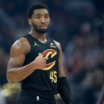Dec 14, 2025; Cleveland, Ohio, USA; Cleveland Cavaliers guard Donovan Mitchell (45) stands on the court in the first quarter against the Charlotte Hornets at Rocket Arena. Mandatory Credit: David Richard-Imagn Images