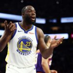 Dec 18, 2025; Phoenix, Arizona, USA; Golden State Warriors forward Draymond Green (23) reacts against the Phoenix Suns at Mortgage Matchup Center. Mandatory Credit: Mark J. Rebilas-Imagn Images