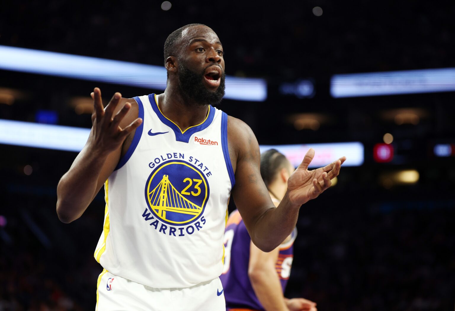 Dec 18, 2025; Phoenix, Arizona, USA; Golden State Warriors forward Draymond Green (23) reacts against the Phoenix Suns at Mortgage Matchup Center. Mandatory Credit: Mark J. Rebilas-Imagn Images