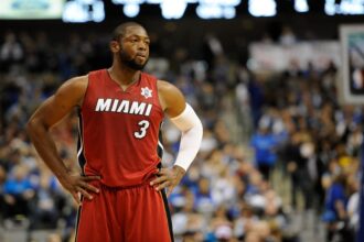 Dec 25, 2011; Dallas, TX, USA; Miami Heat shooting guard Dwyane Wade (3) takes a break from facing the Dallas Mavericks during their game at the American Airlines Center. The Heat defeated the Mavericks 105-94. Mandatory Credit: Jerome Miron-Imagn Images
