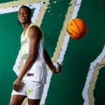 MJ Curry poses during a photoshoot for the South Florida Bulls. Mandatory Credit: X user: @Mj_Curry20