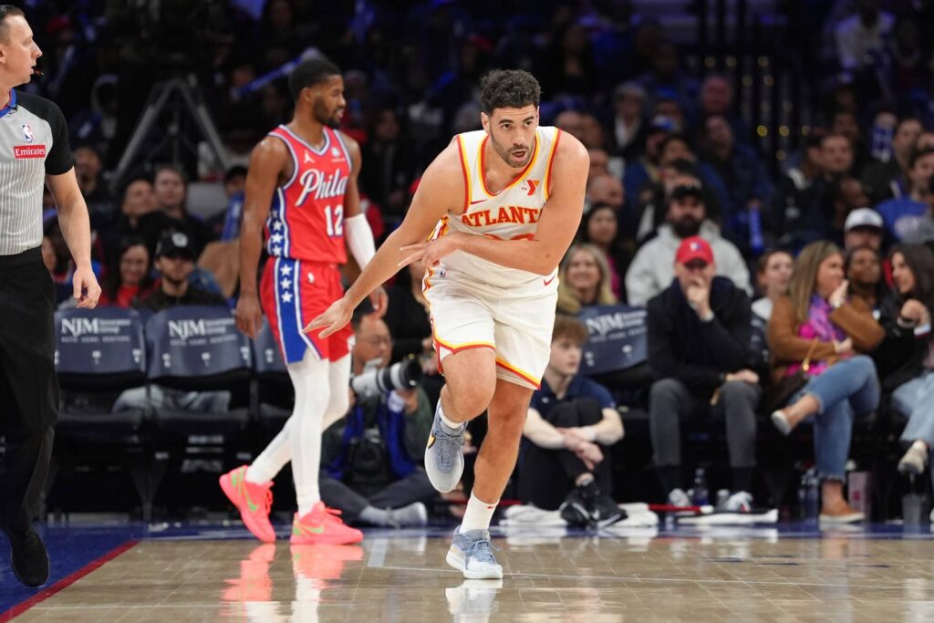 Apr 11, 2025; Philadelphia, Pennsylvania, USA; Atlanta Hawks forward Georges Niang (20) reacts after scoring against the Philadelphia 76ers in the third quarter at Wells Fargo Center. Mandatory Credit: Kyle Ross-Imagn Images