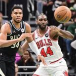 Nov 7, 2025; Milwaukee, Wisconsin, USA; Milwaukee Bucks forward Giannis Antetokounmpo (34) passes the ball away from Chicago Bulls forward Patrick Williams (44) in the second quarter at Fiserv Forum. Mandatory Credit: Benny Sieu-Imagn Images