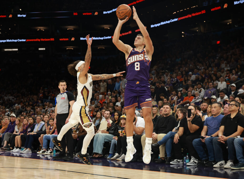 Nov 10, 2025; Phoenix, Arizona, USA; Phoenix Suns guard Grayson Allen (8) shoots a three pointer against the New Orleans Pelicans in the second half at the Mortgage Matchup Center. Mandatory Credit: Mark J. Rebilas-Imagn Images