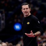 Nov 14, 2025; New Orleans, Louisiana, USA; Los Angeles Lakers Head Coach JJ Redick at the bench against the New Orleans Pelicans during the first half at Smoothie King Center. Mandatory Credit: Stephen Lew-Imagn Images