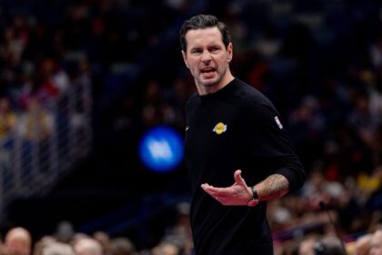 Nov 14, 2025; New Orleans, Louisiana, USA; Los Angeles Lakers Head Coach JJ Redick at the bench against the New Orleans Pelicans during the first half at Smoothie King Center. Mandatory Credit: Stephen Lew-Imagn Images