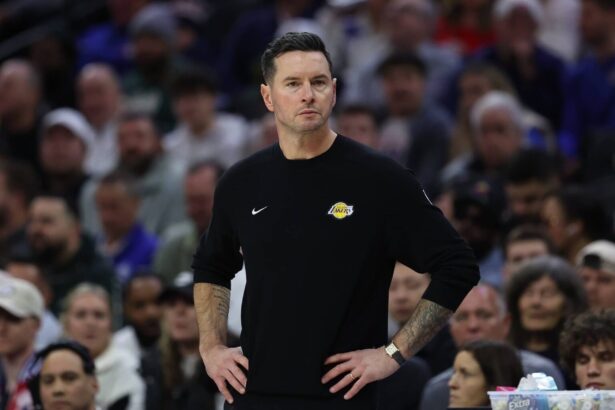 Dec 7, 2025; Philadelphia, Pennsylvania, USA; Los Angeles Lakers head coach JJ Redick looks on during the second quarter against the Philadelphia 76ers at Xfinity Mobile Arena. Mandatory Credit: Bill Streicher-Imagn Images