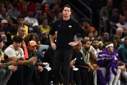 Dec 23, 2025; Phoenix, Arizona, USA; Los Angeles Lakers head coach JJ Redick against the Phoenix Suns at Mortgage Matchup Center. Mandatory Credit: Mark J. Rebilas-Imagn Images