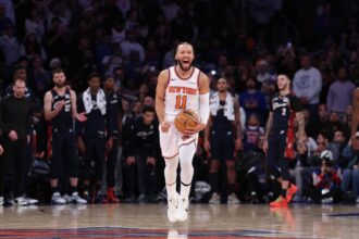 New York Knicks guard Jalen Brunson (11) reacts during the fourth quarter against the Cleveland Cavaliers at Madison Square Garden.