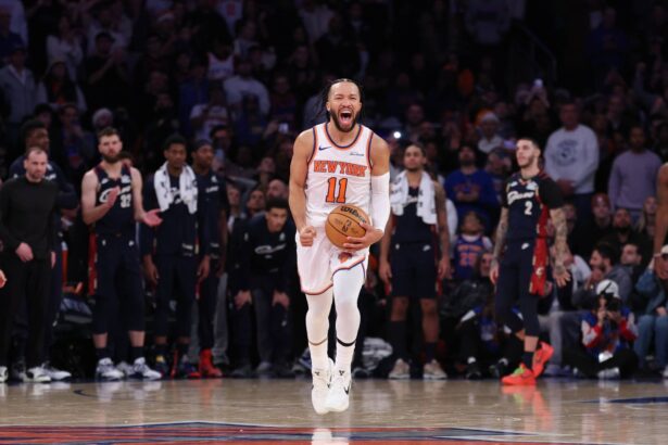 New York Knicks guard Jalen Brunson (11) reacts during the fourth quarter against the Cleveland Cavaliers at Madison Square Garden.