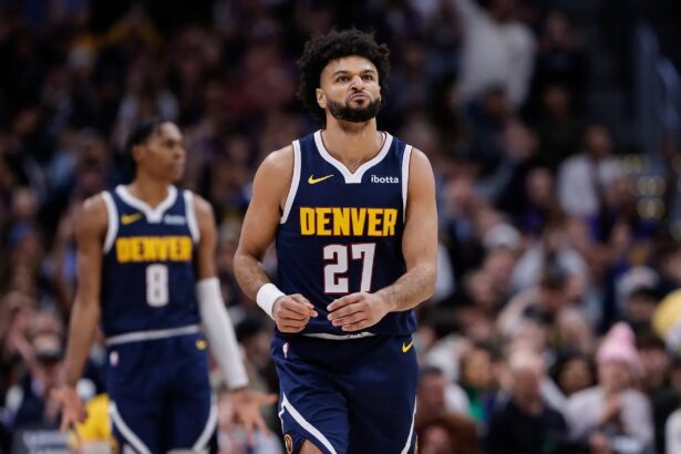 Dec 22, 2025; Denver, Colorado, USA; Denver Nuggets guard Jamal Murray (27) reacts after a play in the first quarter against the Utah Jazz at Ball Arena. Mandatory Credit: Isaiah J. Downing-Imagn Images
