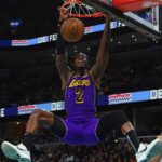 Mar 29, 2025; Memphis, Tennessee, USA; Los Angeles Lakers forward Jarred Vanderbilt (2) dunks during the second quarter against the Memphis Grizzlies at FedExForum. Mandatory Credit: Petre Thomas-Imagn Images