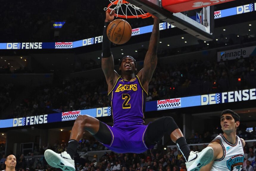 Mar 29, 2025; Memphis, Tennessee, USA; Los Angeles Lakers forward Jarred Vanderbilt (2) dunks during the second quarter against the Memphis Grizzlies at FedExForum. Mandatory Credit: Petre Thomas-Imagn Images