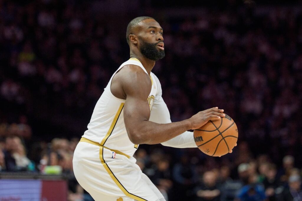 Boston Celtics guard Jaylen Brown (7) shoots against the Minnesota Timberwolves in the first quarter at Target Center.