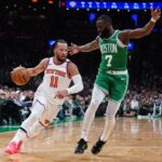 New York Knicks guard Jalen Brunson (11) drives the ball against Boston Celtics guard Jaylen Brown (7) in the first quarter during game two of the second round for the 2025 NBA Playoffs at TD Garden.