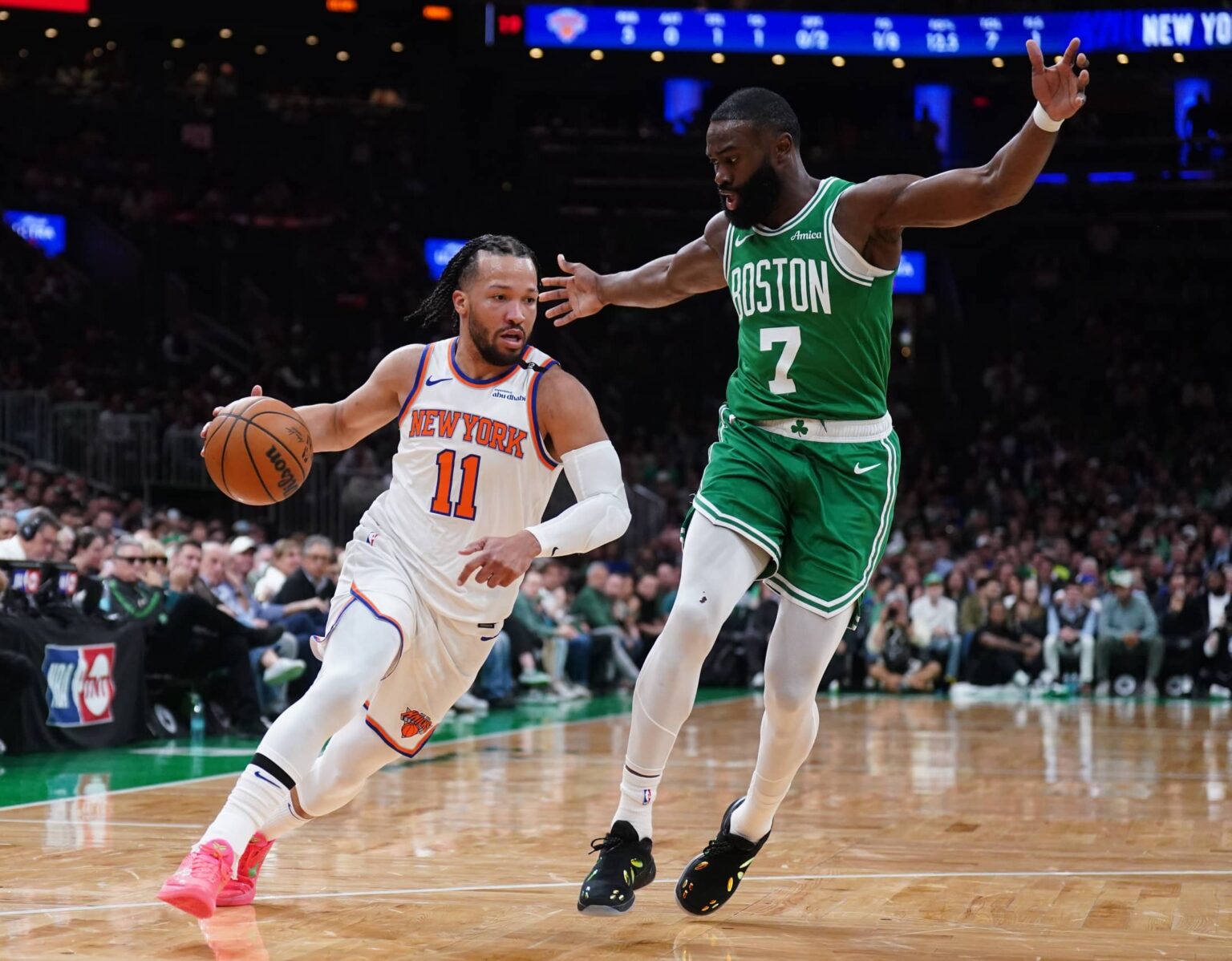 New York Knicks guard Jalen Brunson (11) drives the ball against Boston Celtics guard Jaylen Brown (7) in the first quarter during game two of the second round for the 2025 NBA Playoffs at TD Garden.