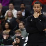 Boston Celtics head coach Joe Mazzulla looks on from the bench Washington Wizards in the second half at Capital One Arena.
